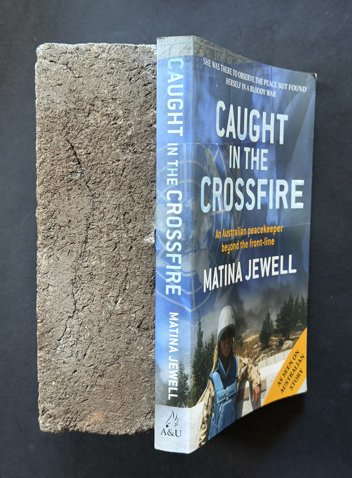 Caught in the Crossfire by Matina Jewell