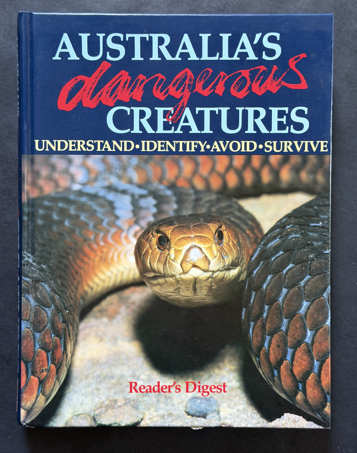 Australia's Dangerous Creatures by David Underhill, Struan Keith Sutherland